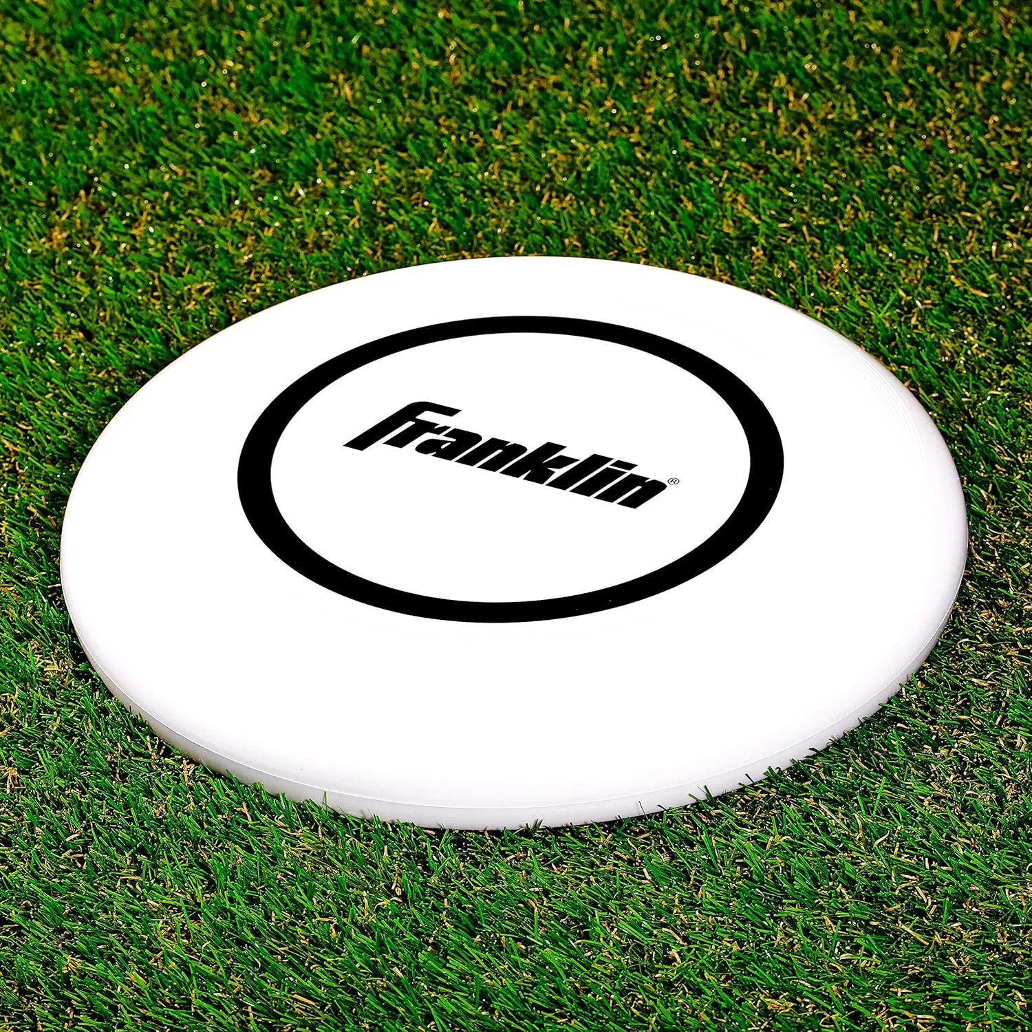 Franklin Sports Flying Disc - Disc for Beach, Backyard, Lawn, Park, Camping - 140 or 175 Grams - Perfect for Dogs - White